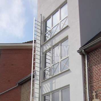 Fire escape foldout ladder for 2 and 3 storey building JOMY fire escape foldout ladder installed on the facade of a 3 storey building.